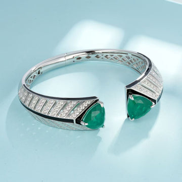 Emerald Elegance: The Allure of This Silver and Glass Bangle