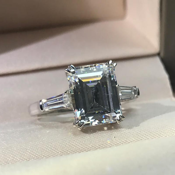 Emerald Cut Tapered Three Stone Ring - jewel-inside